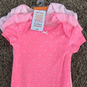 Never worn 3 month Carters Baby girl onsies